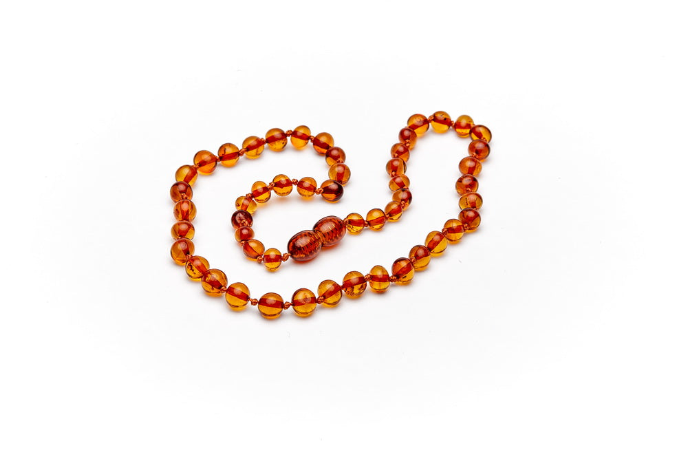Baby barnsteen ketting cognac amberos