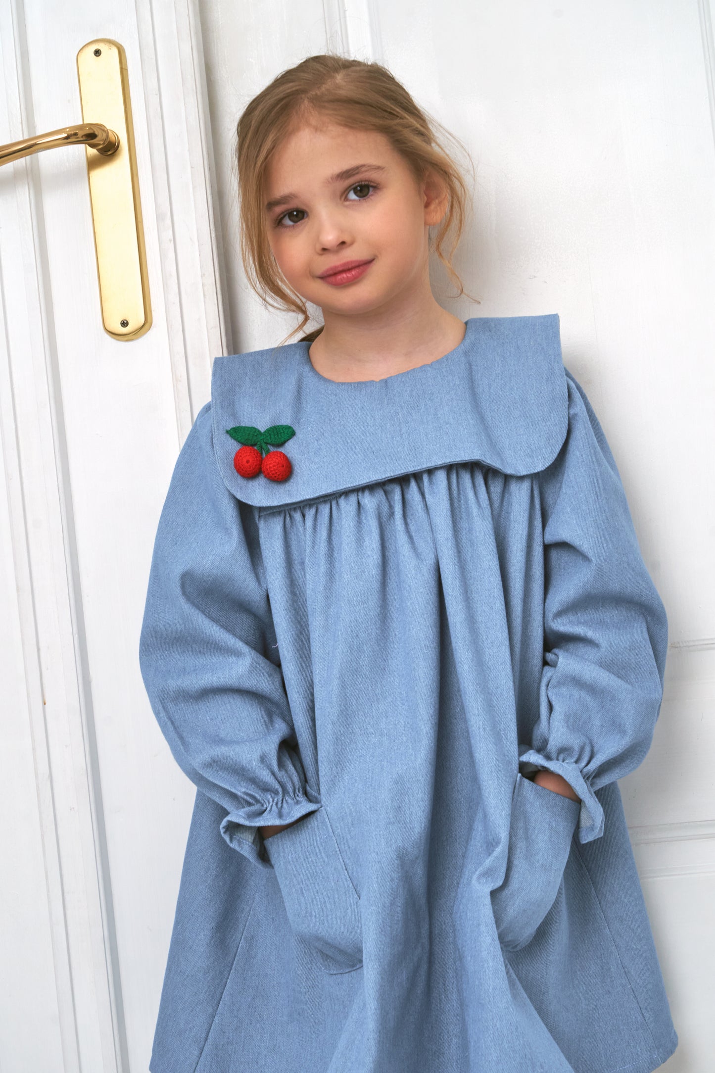 Girls denim dress with pockets and cherry detail