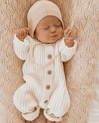 Knitted newborn jumpsuit