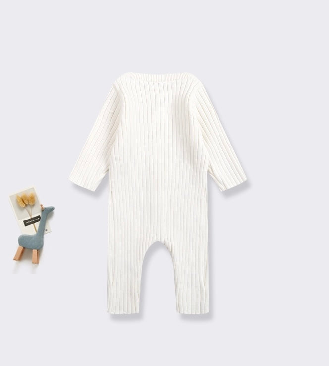 Knitted newborn jumpsuit