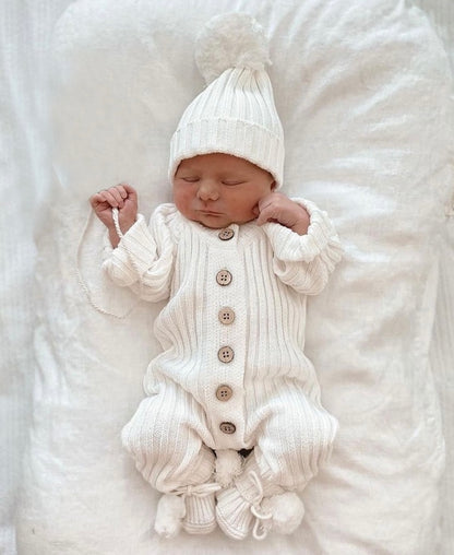 Knitted newborn jumpsuit