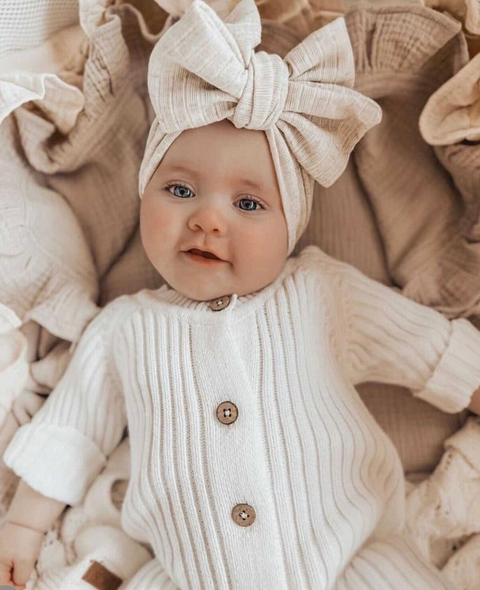 Knitted newborn jumpsuit